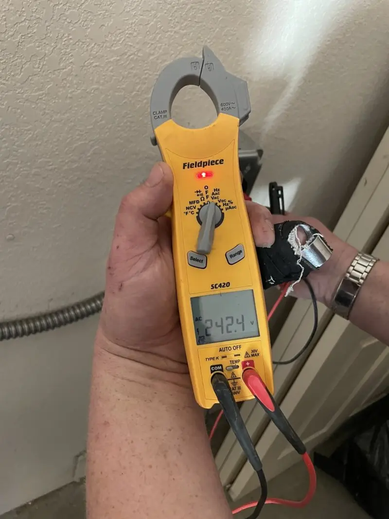 Voltage testing with clamp meter during Hot Tub / Pool Electrical Wiring in Lexington